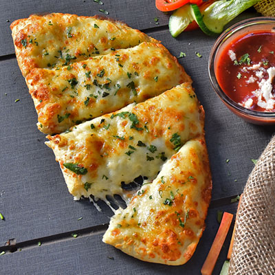 Cheezy Sticks - Freshly Baked Bread Filled With The Yummiest Cheese Blend To Satisfy Your Cravings.